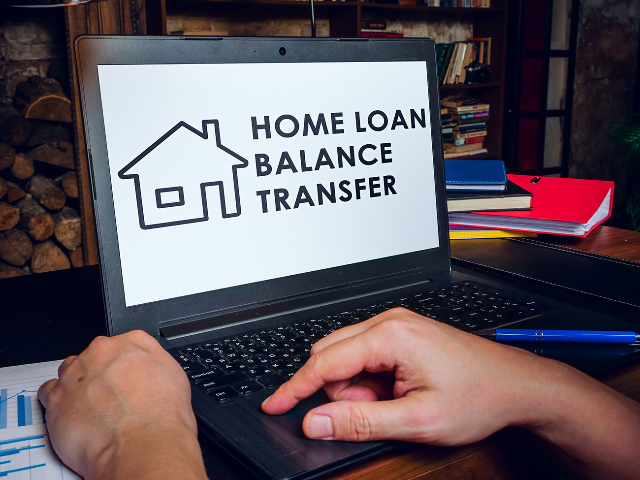 Laptop displaying details of home loan balance transfer