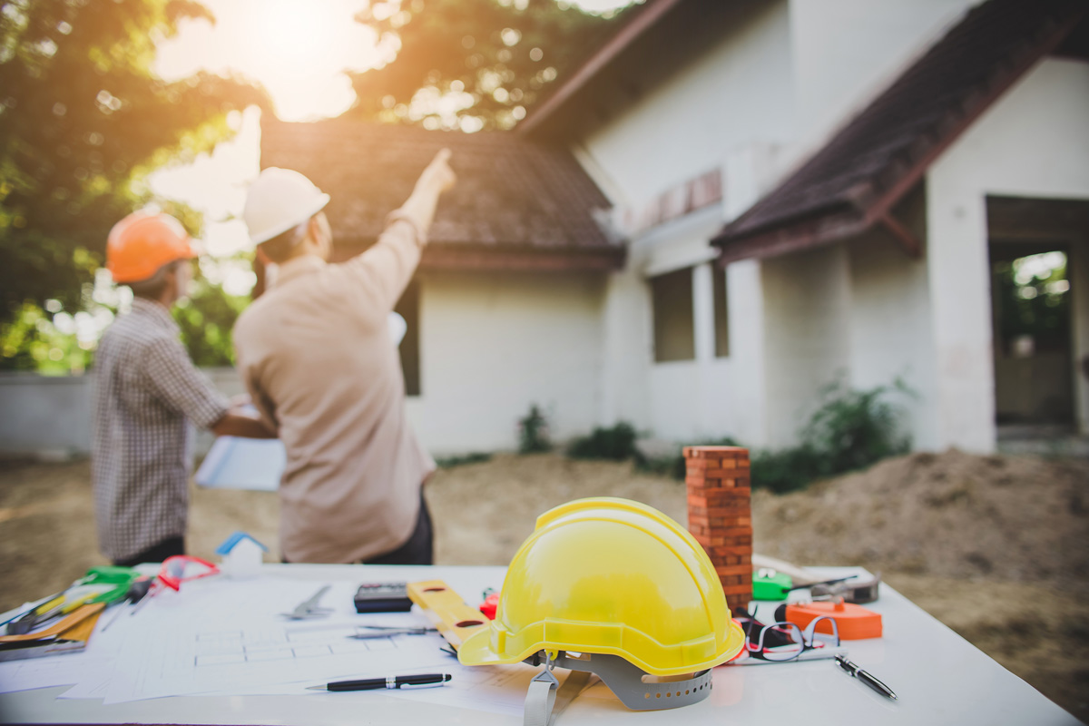 Engineer inspecting home construction