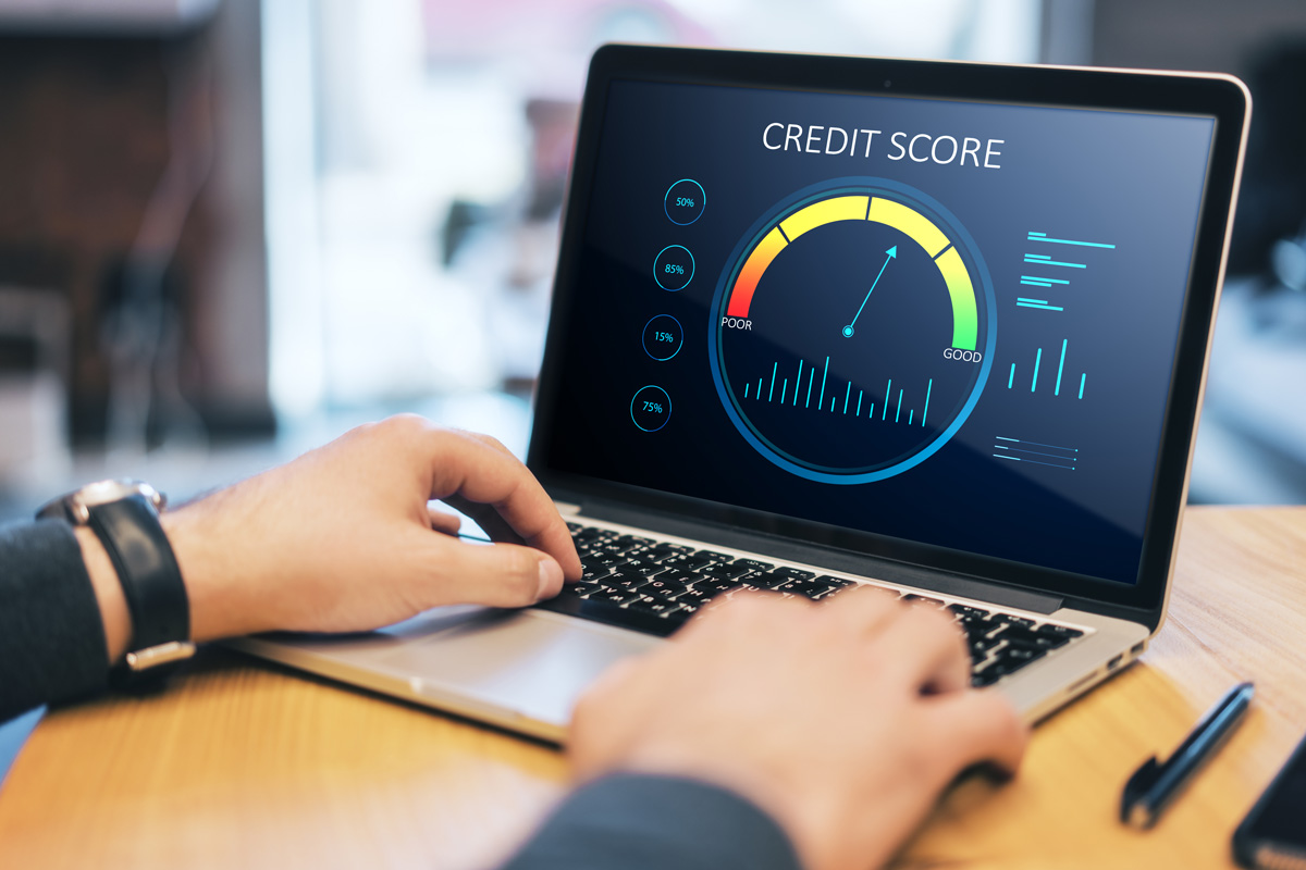 Laptop displaying an abstract cibil score scale