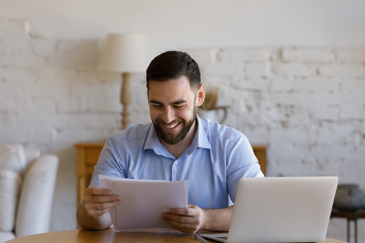 Real estate agent holding required documents for loan against property