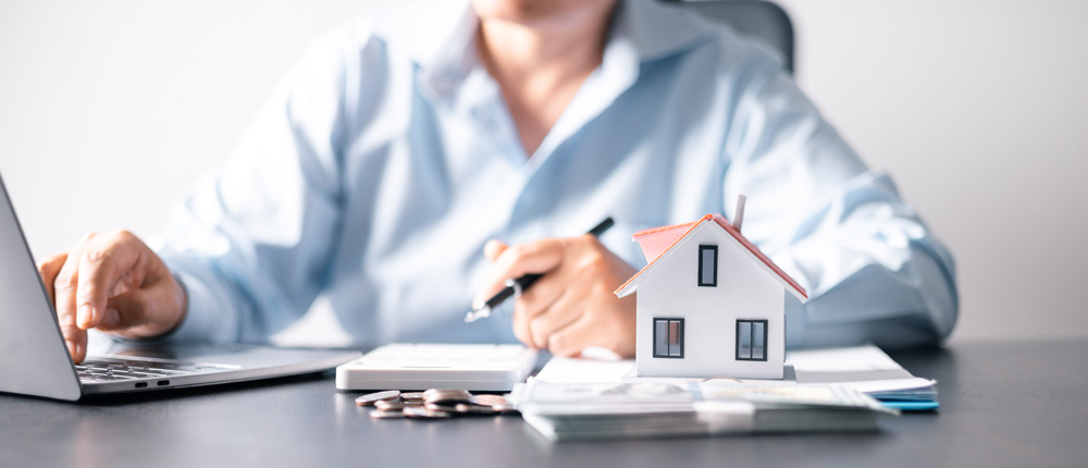 House with money representing loan against property